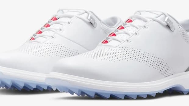 View of white and grey Jordan shoes.